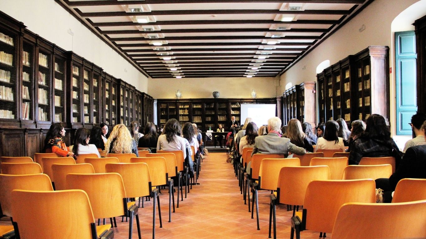 People sharing a meal in a bright community dining space